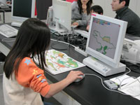 年賀状の絵をかいています